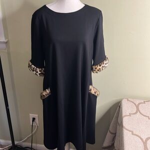 Sara Campbell black short sleeve fur trim cheetah front pockets swing dress